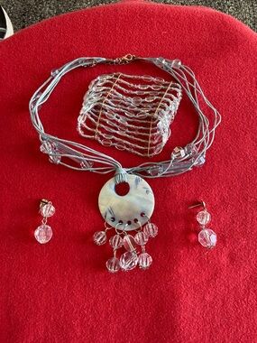 Handmade necklace. bracelet and earrings. blue and white